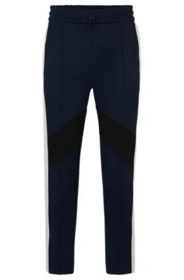 Relaxed-fit tracksuit bottoms with color-blocking