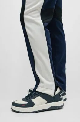 Relaxed-fit tracksuit bottoms with color-blocking