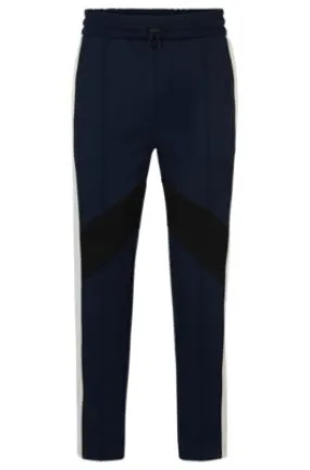 Relaxed-fit tracksuit bottoms with color-blocking