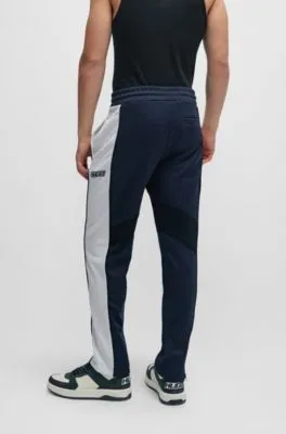 Relaxed-fit tracksuit bottoms with color-blocking