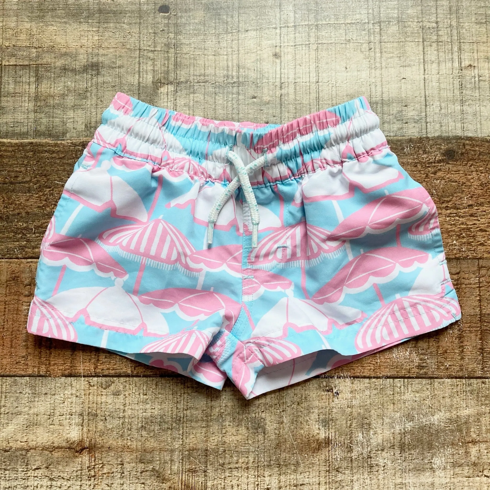 The Beaufort Bonnet Company Light Blue/Pink Beach Umbrella Swim Trunks- Size 6-12M